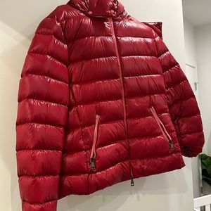 Red moncler women’s jacket with pink interior